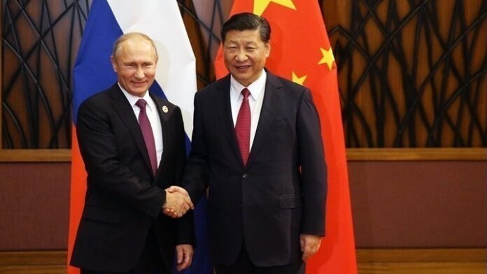 Ο Σι Τζινπίνγκ και ο Βλαντίμιρ Πούτιν συζητούν στη Μόσχα
